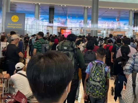 System issue disrupts immigration clearance at Singapore's .